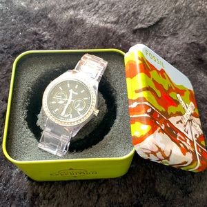 Fossil women hand watch, plastic clear strap